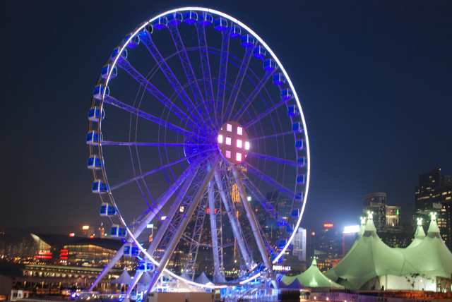 Ferris wheel lit up at night